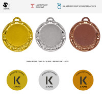 Zamak Medaille Historia